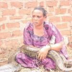 Bizarre! Woman In Snake Breastfeeding Drama